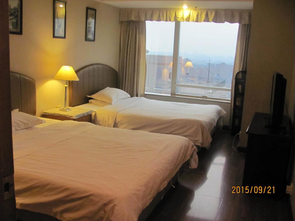 Beijing New World Cbd Apartment Room photo