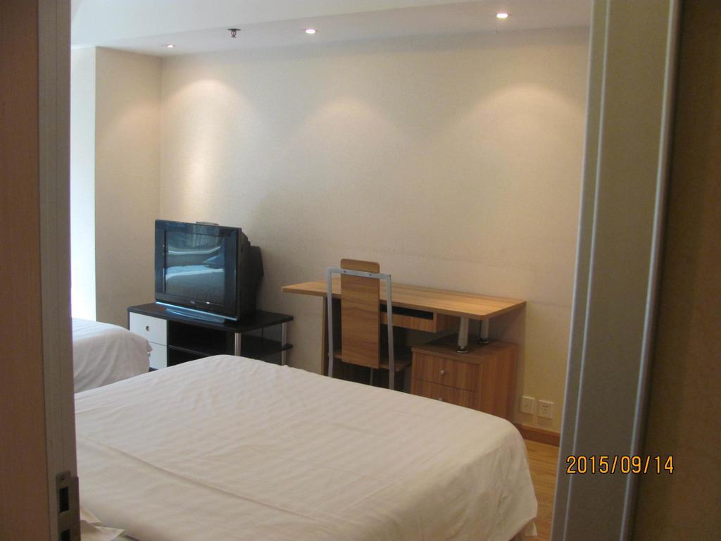 Beijing New World Cbd Apartment Room photo